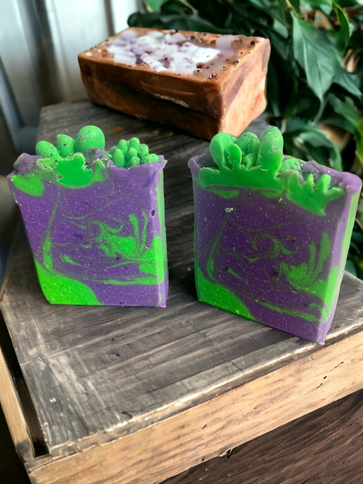 green and purple soap scented in a floral fragrance 